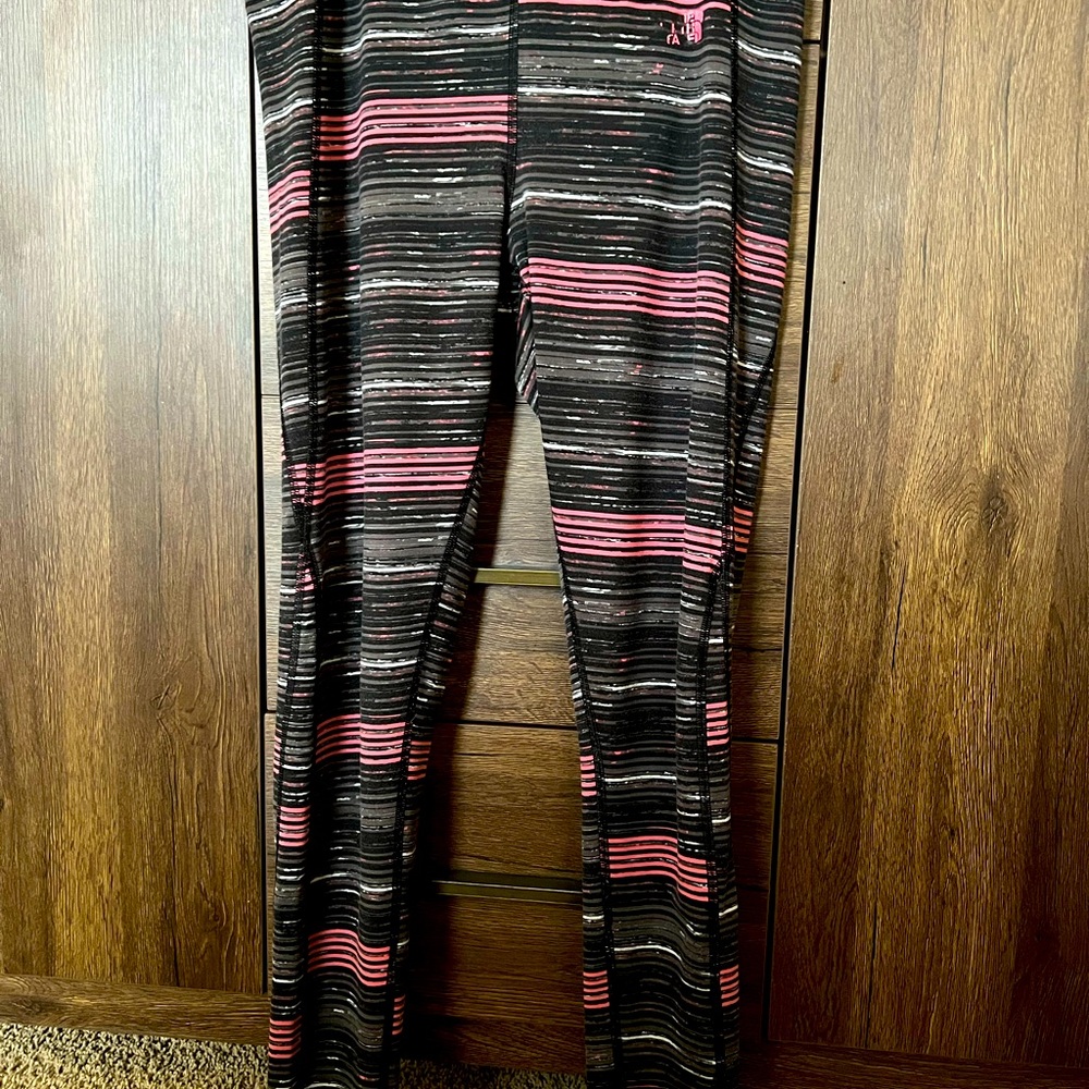 The North Face gray, black and pink leggings that are buttery soft. Great find!
